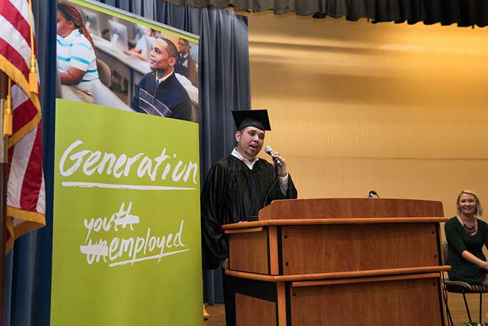 Speaker and Generation student Brandon Mead, Jacksonville, addresses an audience of families and graduates on Friday, Sept. 29 on Florida State College’s downtown Jacksonville campus.